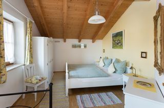 Schlafzimmer Ferienwohnung Kampenwand