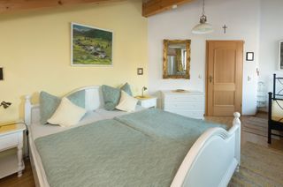 Schlafzimmer Ferienwohnung Kampenwand