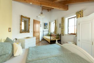 Schlafzimmer Ferienwohnung Kampenwand