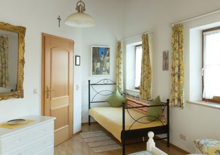 Schlafzimmer Ferienwohnung Kampenwand