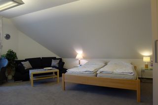 Bett und Sitzecke