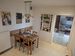 Küche mit Esstisch in der Ferienwohnung Am Eselhaus in Rhede