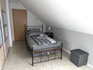 Schlafzimmer 1 mit Einzelbett