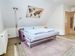 Schlafcouch im Wohnzimmer der Ferienwohnung Warendorf 12