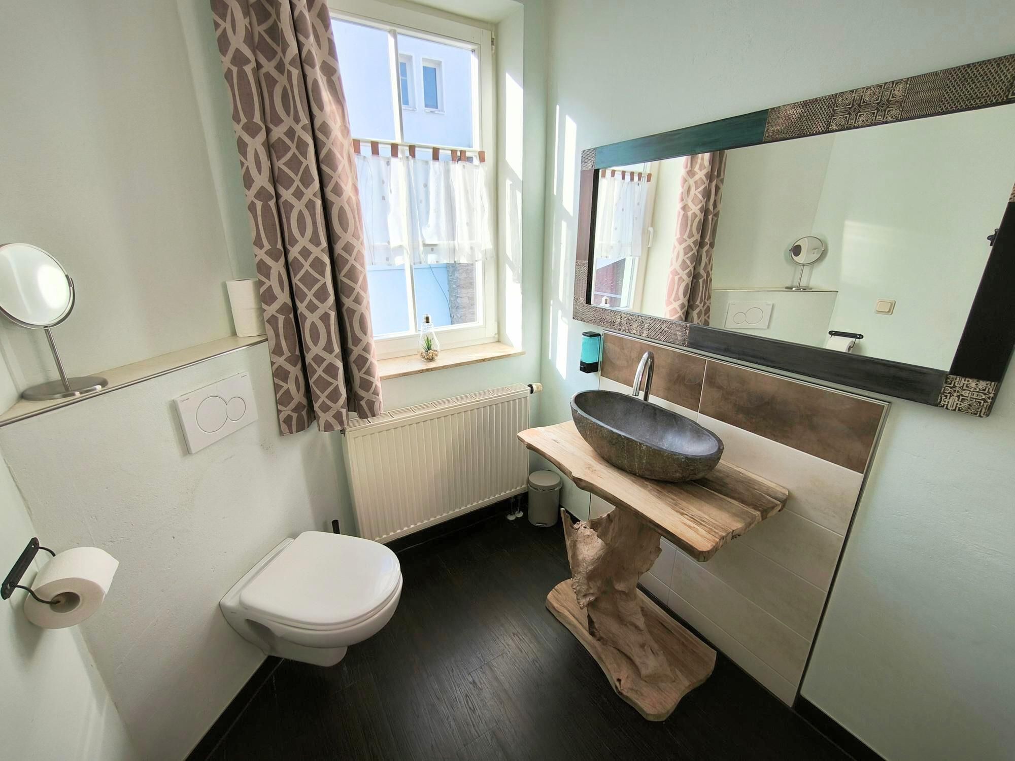 Bad mit bodengleicher Dusche