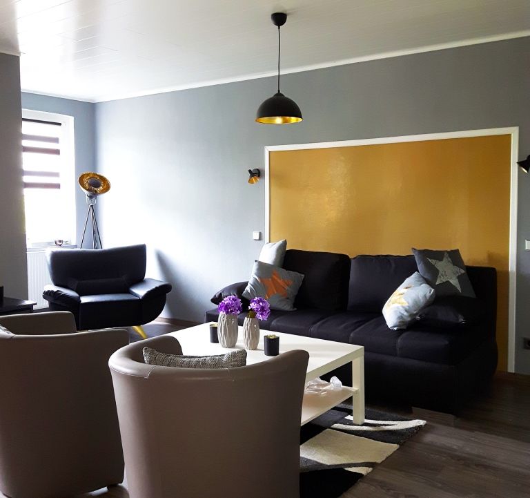 Wohnzimmer mit Schlafsofa