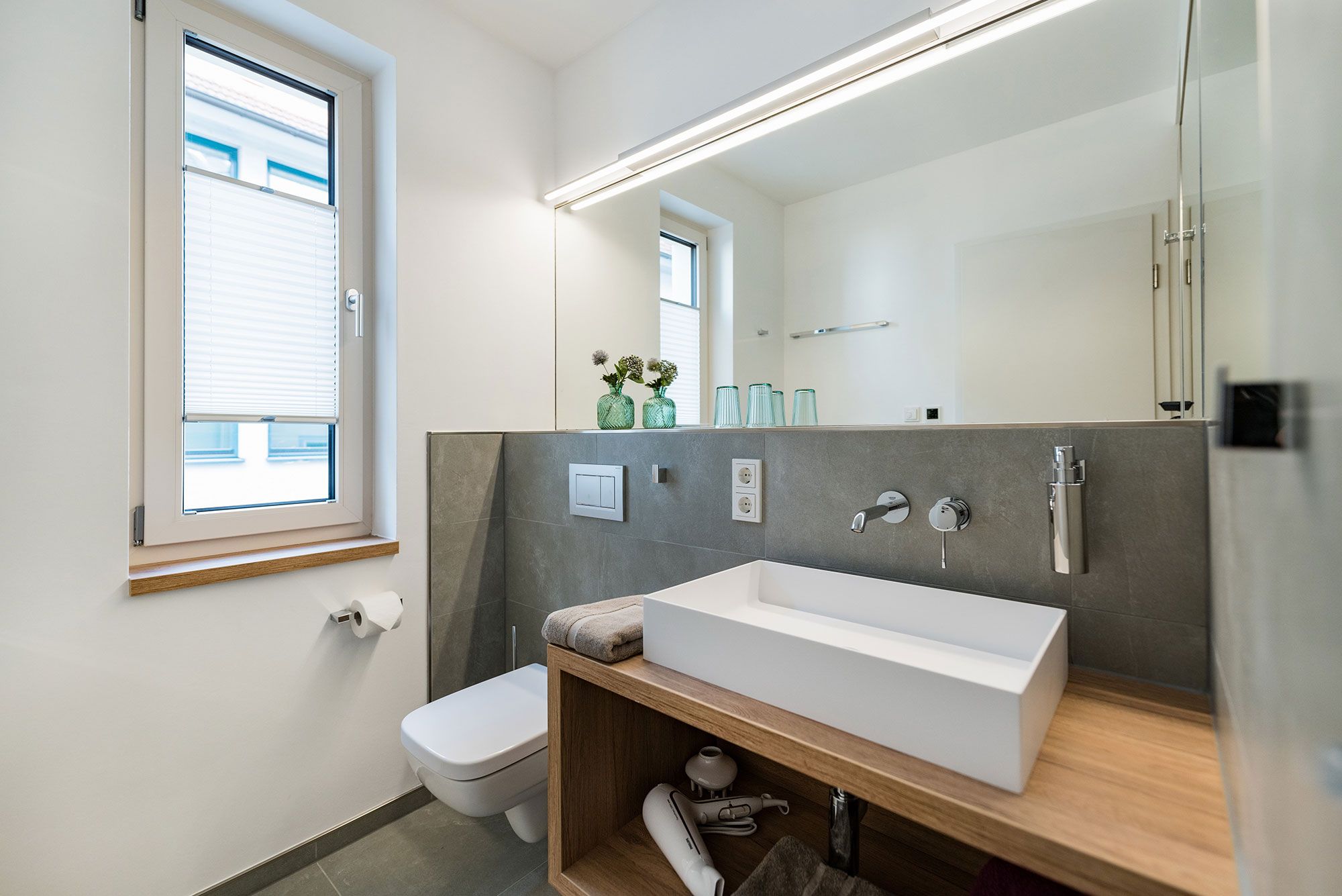 Suites MITTE - Badezimmer mit bodengleicher Dusch e