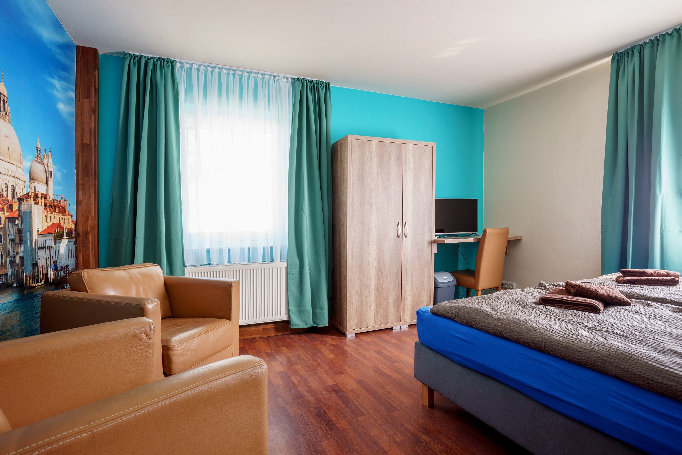 Schlafzimmer oben mit extra Sitzmöglichkeiten